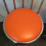 Pair of Modern Atomic Chrome Metal & Orange Vinyl Swivel Stools