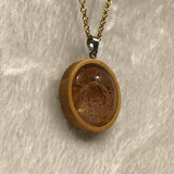 Twin Cat Orange Textured Design  in Wood Bezel Necklace on Gold Chain