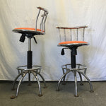 Pair of Modern Atomic Chrome Metal & Orange Vinyl Swivel Stools