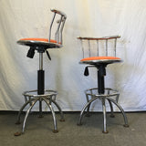 Pair of Modern Atomic Chrome Metal & Orange Vinyl Swivel Stools