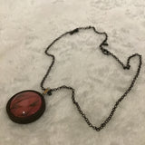 Twin Cat Pink Botanical Print in Dark Wood Bezel Necklace on Dark Metal Chain