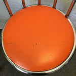 Pair of Modern Atomic Chrome Metal & Orange Vinyl Swivel Stools