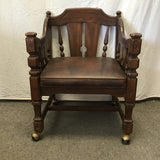 Vintage Jacobean Revival Solid Walnut & Brown Vinyl Rolling Armchair