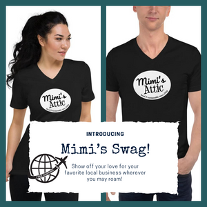 Introducing Mimi's Swag! Show off your love for your favorite local business wherever you may roam! Split images of woman and man wearing Mimi's Attic T-shirts. Shirts are black with Mimi's Attic logo on the front in white