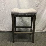 Single Modern Grey Upholstered Saddle Bar Stool