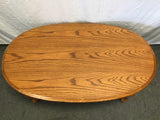 Vintage Farmhouse Oak Veneer Oval Coffee Table